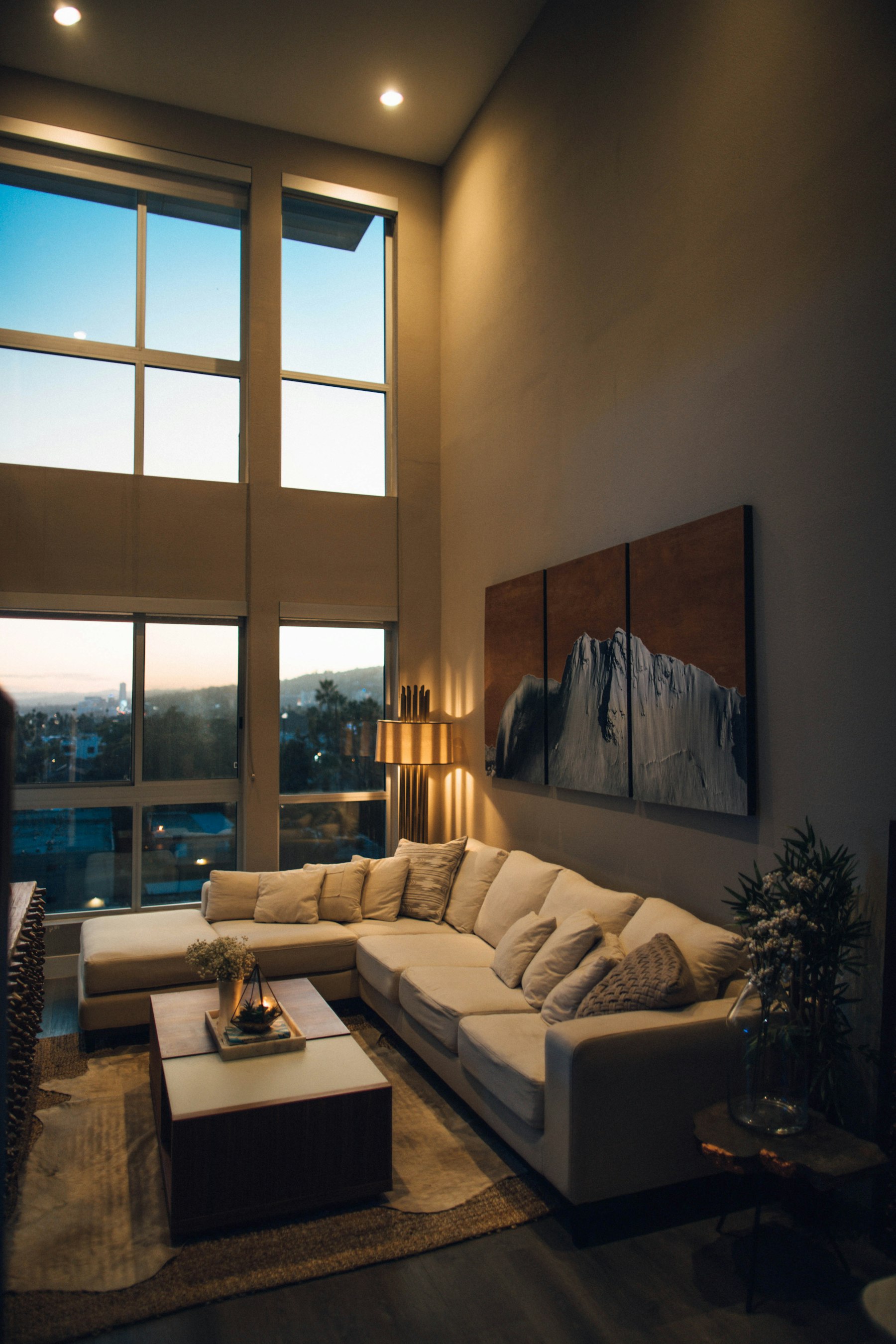 Evening-lit double height living room